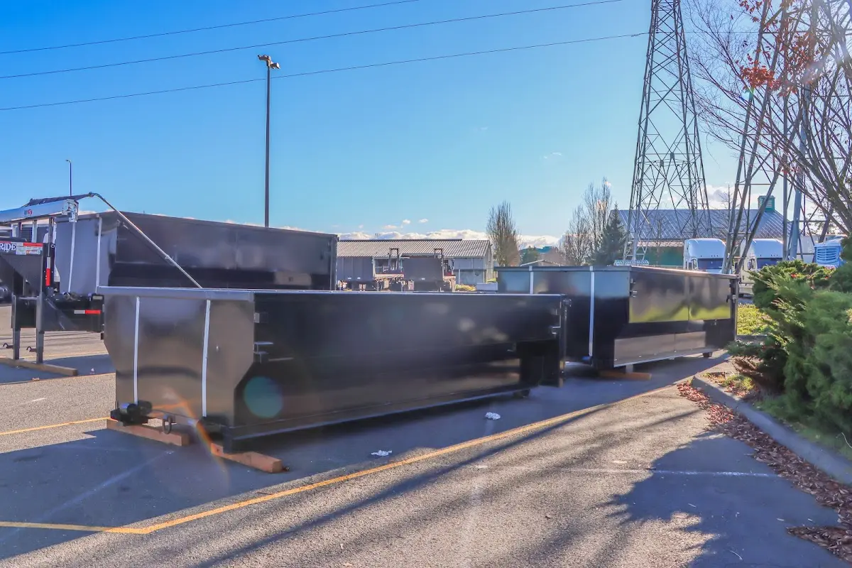 Roll-off dumpster ready for waste disposal at job site for Roofing Dumpster Rental in Norman